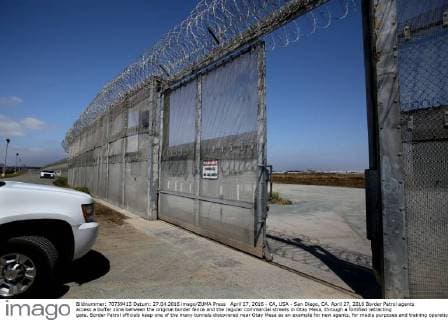 April 27, 2016 - CA, USA - San Diego, CA. April 27, 2016 Border Patrol agents access a buffer zone between the original border fence and the regular commercial streets in Otay Mesa, through a fortified retracting gate. Border Patrol officials keep one of the many tunnels discovered near Otay Mesa as an example for new agents, for media purposes and training operations. Known as the Galvez tunnel, it s an example of one of the more developed tunnels, having nearly twice the height of the recently discovered tunnels, with electrical wiring and rails for moving bundles under the border. Mandatory photo credit: USA - ZUMAs44_