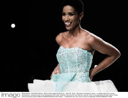 April 28, 2016 - Barcelona, Catalonia, Spain - A model walks the runway presenting a wedding dress of the Spring Summer 2017 collection during the Jordi Dalmau catwalk show at the Barcelona Bridal Fashion Week 2016 Barcelona Spain - ZUMAo105