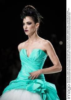 April 28, 2016 - Barcelona, Catalonia, Spain - A model walks the runway presenting a wedding dress of the Spring Summer 2017 collection during the Jordi Dalmau catwalk show at the Barcelona Bridal Fashion Week 2016 Barcelona Spain - ZUMAo105