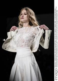 April 28, 2016 - Barcelona, Catalonia, Spain - A model walks the runway presenting a wedding dress of the Spring Summer 2017 collection during the Jordi Dalmau catwalk show at the Barcelona Bridal Fashion Week 2016 Barcelona Spain - ZUMAo105