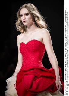 April 28, 2016 - Barcelona, Catalonia, Spain - A model walks the runway presenting a wedding dress of the Spring Summer 2017 collection during the Jordi Dalmau catwalk show at the Barcelona Bridal Fashion Week 2016 Barcelona Spain - ZUMAo105