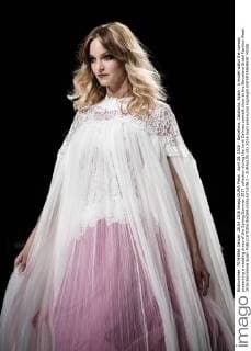April 28, 2016 - Barcelona, Catalonia, Spain - A model walks the runway presenting a wedding dress of the Spring Summer 2017 collection during the Jordi Dalmau catwalk show at the Barcelona Bridal Fashion Week 2016 Barcelona Spain - ZUMAo105