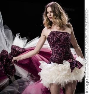 April 28, 2016 - Barcelona, Catalonia, Spain - A model walks the runway presenting a wedding dress of the Spring Summer 2017 collection during the Jordi Dalmau catwalk show at the Barcelona Bridal Fashion Week 2016 Barcelona Spain - ZUMAo105
