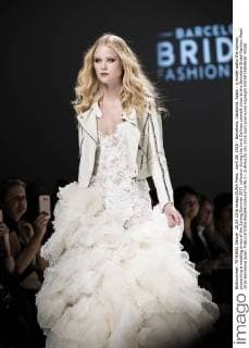 April 28, 2016 - Barcelona, Catalonia, Spain - A model walks the runway presenting a wedding dress of the Spring Summer 2017 collection during the Jordi Dalmau catwalk show at the Barcelona Bridal Fashion Week 2016 Barcelona Spain - ZUMAo105