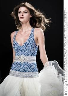 April 28, 2016 - Barcelona, Catalonia, Spain - A model walks the runway presenting a wedding dress of the Spring Summer 2017 collection during the Jordi Dalmau catwalk show at the Barcelona Bridal Fashion Week 2016 Barcelona Spain - ZUMAo105