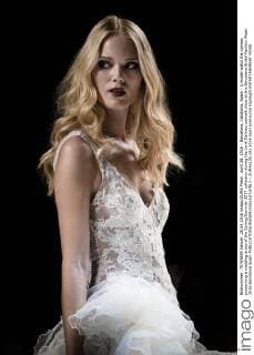 April 28, 2016 - Barcelona, Catalonia, Spain - A model walks the runway presenting a wedding dress of the Spring Summer 2017 collection during the Jordi Dalmau catwalk show at the Barcelona Bridal Fashion Week 2016 Barcelona Spain - ZUMAo105