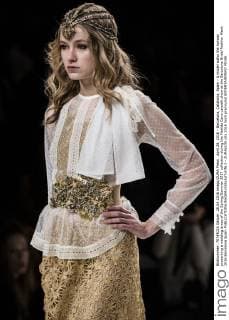 April 28, 2016 - Barcelona, Catalonia, Spain - A model walks the runway presenting a wedding dress of the Spring Summer 2017 collection during the Matilde Cano catwalk show at the Barcelona Bridal Fashion Week 2016 Barcelona Spain - ZUMAo105