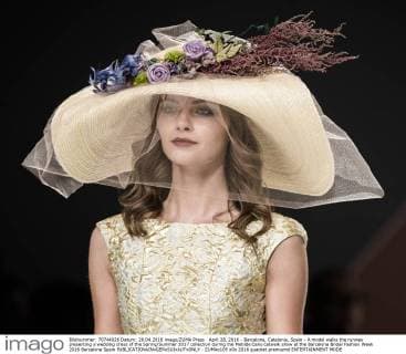 April 28, 2016 - Barcelona, Catalonia, Spain - A model walks the runway presenting a wedding dress of the Spring Summer 2017 collection during the Matilde Cano catwalk show at the Barcelona Bridal Fashion Week 2016 Barcelona Spain - ZUMAo105