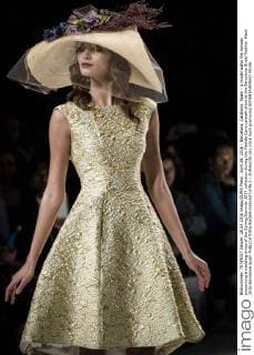April 28, 2016 - Barcelona, Catalonia, Spain - A model walks the runway presenting a wedding dress of the Spring Summer 2017 collection during the Matilde Cano catwalk show at the Barcelona Bridal Fashion Week 2016 Barcelona Spain - ZUMAo105