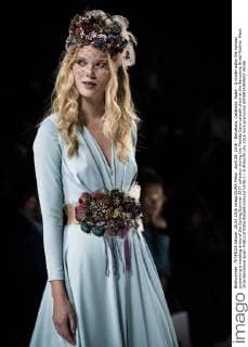 April 28, 2016 - Barcelona, Catalonia, Spain - A model walks the runway presenting a wedding dress of the Spring Summer 2017 collection during the Matilde Cano catwalk show at the Barcelona Bridal Fashion Week 2016 Barcelona Spain - ZUMAo105