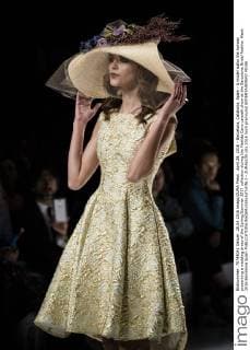 April 28, 2016 - Barcelona, Catalonia, Spain - A model walks the runway presenting a wedding dress of the Spring Summer 2017 collection during the Matilde Cano catwalk show at the Barcelona Bridal Fashion Week 2016 Barcelona Spain - ZUMAo105