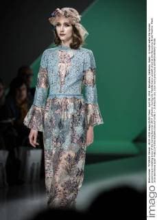 April 28, 2016 - Barcelona, Catalonia, Spain - A model walks the runway presenting a wedding dress of the Spring Summer 2017 collection during the Matilde Cano catwalk show at the Barcelona Bridal Fashion Week 2016 Barcelona Spain - ZUMAo105
