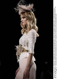 April 28, 2016 - Barcelona, Catalonia, Spain - A model walks the runway presenting a wedding dress of the Spring Summer 2017 collection during the Matilde Cano catwalk show at the Barcelona Bridal Fashion Week 2016 Barcelona Spain - ZUMAo105