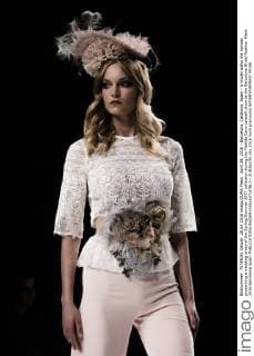 April 28, 2016 - Barcelona, Catalonia, Spain - A model walks the runway presenting a wedding dress of the Spring Summer 2017 collection during the Matilde Cano catwalk show at the Barcelona Bridal Fashion Week 2016 Barcelona Spain - ZUMAo105