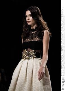 April 28, 2016 - Barcelona, Catalonia, Spain - A model walks the runway presenting a wedding dress of the Spring Summer 2017 collection during the Matilde Cano catwalk show at the Barcelona Bridal Fashion Week 2016 Barcelona Spain - ZUMAo105