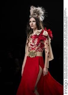 April 28, 2016 - Barcelona, Catalonia, Spain - A model walks the runway presenting a wedding dress of the Spring Summer 2017 collection during the Matilde Cano catwalk show at the Barcelona Bridal Fashion Week 2016 Barcelona Spain - ZUMAo105