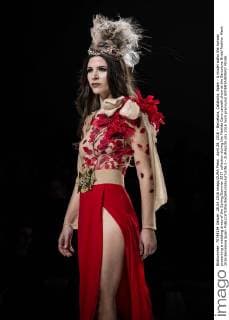April 28, 2016 - Barcelona, Catalonia, Spain - A model walks the runway presenting a wedding dress of the Spring Summer 2017 collection during the Matilde Cano catwalk show at the Barcelona Bridal Fashion Week 2016 Barcelona Spain - ZUMAo105