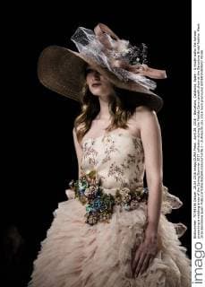 April 28, 2016 - Barcelona, Catalonia, Spain - A model walks the runway presenting a wedding dress of the Spring Summer 2017 collection during the Matilde Cano catwalk show at the Barcelona Bridal Fashion Week 2016 Barcelona Spain - ZUMAo105