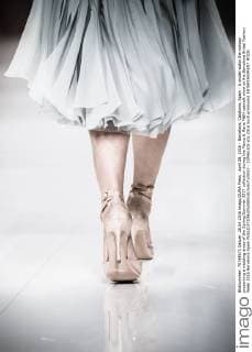 April 28, 2016 - Barcelona, Catalonia, Spain - A model walks the runway presenting a wedding dress of the Spring Summer 2017 collection during the Marco & Maria M&M catwalk show at the Barcelona Bridal Fashion Week 2016 Barcelona Spain - ZUMAo105