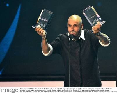 US singer Nicky Jam poses with two awards during the ceremony of the Latin Music Billboard Awards at the BankUnited Center in Coral Gables, Florida, United States, 28 April 2016. LATIN MUSIC BILLBOARD AWARDS !ACHTUNG: NUR REDAKTIONELLE NUTZUNG!  CGS039 20160429-635974985694606292