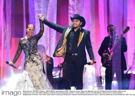 Mexican singer Alejandra Guzman (L) and US Gerardo Ortiz perform during the ceremony of the Latin Music Billboard Awards at the BankUnited Center in Coral Gables, Florida, United States, 28 April 2016. LATIN MUSIC BILLBOARD AWARDS !ACHTUNG: NUR REDAKTIONELLE NUTZUNG!  CGS045 20160429-635974990279577857