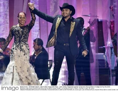 Latin artists Alejandra Guzman & Gerardo Ortiz perform on stage during the 2016 Billboard Latin Music Awards and Show at the Bank United Center, University of Miami, Miami, Florida on April 28, 2016.  MIA20160428115 GARYxIxROTHSTEIN