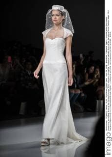 April 29, 2016 - Barcelona, Catalonia, Spain - A model walks the runway presenting a wedding dress of the Spring Summer 2017 collection during the Cymbeline catwalk show at the Barcelona Bridal Fashion Week 2016 Barcelona Spain - ZUMAo105