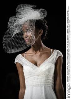 April 29, 2016 - Barcelona, Catalonia, Spain - A model walks the runway presenting a wedding dress of the Spring Summer 2017 collection during the Cymbeline catwalk show at the Barcelona Bridal Fashion Week 2016 Barcelona Spain - ZUMAo105