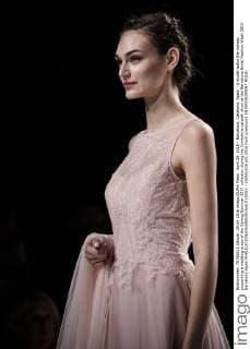 April 29, 2016 - Barcelona, Catalonia, Spain - A model walks the runway presenting a wedding dress of the Spring Summer 2017 collection during the Cymbeline catwalk show at the Barcelona Bridal Fashion Week 2016 Barcelona Spain - ZUMAo105