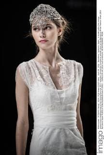 April 29, 2016 - Barcelona, Catalonia, Spain - A model walks the runway presenting a wedding dress of the Spring Summer 2017 collection during the Cymbeline catwalk show at the Barcelona Bridal Fashion Week 2016 Barcelona Spain - ZUMAo105