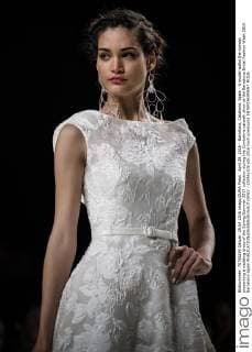 April 29, 2016 - Barcelona, Catalonia, Spain - A model walks the runway presenting a wedding dress of the Spring Summer 2017 collection during the Cymbeline catwalk show at the Barcelona Bridal Fashion Week 2016 Barcelona Spain - ZUMAo105