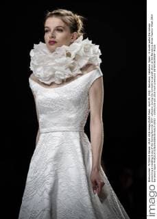 April 29, 2016 - Barcelona, Catalonia, Spain - A model walks the runway presenting a wedding dress of the Spring Summer 2017 collection during the Cymbeline catwalk show at the Barcelona Bridal Fashion Week 2016 Barcelona Spain - ZUMAo105
