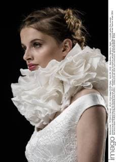 April 29, 2016 - Barcelona, Catalonia, Spain - A model walks the runway presenting a wedding dress of the Spring Summer 2017 collection during the Cymbeline catwalk show at the Barcelona Bridal Fashion Week 2016 Barcelona Spain - ZUMAo105