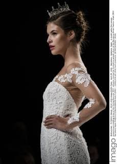 April 29, 2016 - Barcelona, Catalonia, Spain - A model walks the runway presenting a wedding dress of the Spring Summer 2017 collection during the Cymbeline catwalk show at the Barcelona Bridal Fashion Week 2016 Barcelona Spain - ZUMAo105
