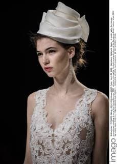 April 29, 2016 - Barcelona, Catalonia, Spain - A model walks the runway presenting a wedding dress of the Spring Summer 2017 collection during the Cymbeline catwalk show at the Barcelona Bridal Fashion Week 2016 Barcelona Spain - ZUMAo105