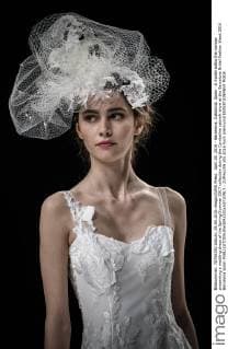 April 29, 2016 - Barcelona, Catalonia, Spain - A model walks the runway presenting a wedding dress of the Spring Summer 2017 collection during the Cymbeline catwalk show at the Barcelona Bridal Fashion Week 2016 Barcelona Spain - ZUMAo105