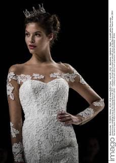 April 29, 2016 - Barcelona, Catalonia, Spain - A model walks the runway presenting a wedding dress of the Spring Summer 2017 collection during the Cymbeline catwalk show at the Barcelona Bridal Fashion Week 2016 Barcelona Spain - ZUMAo105