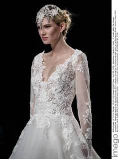 April 29, 2016 - Barcelona, Catalonia, Spain - A model walks the runway presenting a wedding dress of the Spring Summer 2017 collection during the Cymbeline catwalk show at the Barcelona Bridal Fashion Week 2016 Barcelona Spain - ZUMAo105