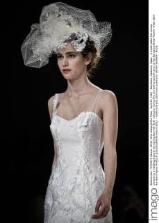 April 29, 2016 - Barcelona, Catalonia, Spain - A model walks the runway presenting a wedding dress of the Spring Summer 2017 collection during the Cymbeline catwalk show at the Barcelona Bridal Fashion Week 2016 Barcelona Spain - ZUMAo105