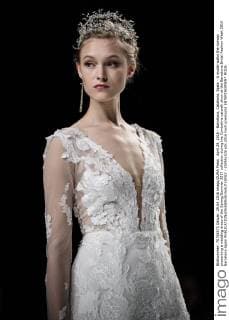 April 29, 2016 - Barcelona, Catalonia, Spain - A model walks the runway presenting a wedding dress of the Spring Summer 2017 collection during the Cymbeline catwalk show at the Barcelona Bridal Fashion Week 2016 Barcelona Spain - ZUMAo105