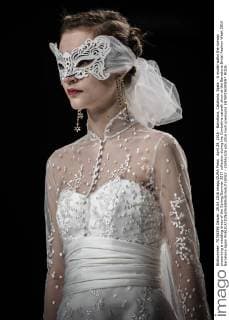 April 29, 2016 - Barcelona, Catalonia, Spain - A model walks the runway presenting a wedding dress of the Spring Summer 2017 collection during the Cymbeline catwalk show at the Barcelona Bridal Fashion Week 2016 Barcelona Spain - ZUMAo105