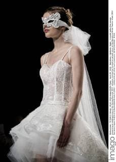 April 29, 2016 - Barcelona, Catalonia, Spain - A model walks the runway presenting a wedding dress of the Spring Summer 2017 collection during the Cymbeline catwalk show at the Barcelona Bridal Fashion Week 2016 Barcelona Spain - ZUMAo105