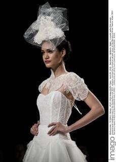 April 29, 2016 - Barcelona, Catalonia, Spain - A model walks the runway presenting a wedding dress of the Spring Summer 2017 collection during the Cymbeline catwalk show at the Barcelona Bridal Fashion Week 2016 Barcelona Spain - ZUMAo105
