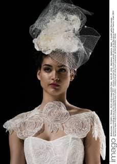 April 29, 2016 - Barcelona, Catalonia, Spain - A model walks the runway presenting a wedding dress of the Spring Summer 2017 collection during the Cymbeline catwalk show at the Barcelona Bridal Fashion Week 2016 Barcelona Spain - ZUMAo105