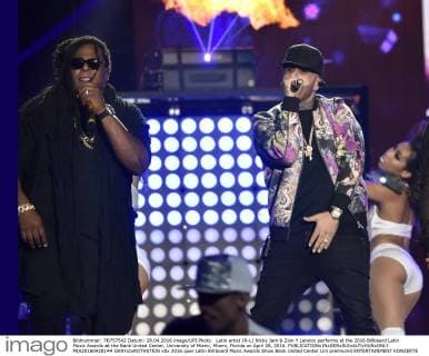 Latin artist (R-L) Nicky Jam & Zion Y Lennox performs at the 2016 Billboard Latin Music Awards at the Bank United Center, University of Miami, Miami, Florida on April 28, 2016.  MIA20160428144 GARYxIxROTHSTEIN