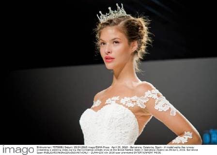 April 29, 2016 - Barcelona, Catalonia, Spain - A model walks the runway presenting a wedding dress during the Cymbeline catwalk show at the Bridal Fashion Week in Barcelona (Spain) on 29 April, 2016. Barcelona Spain  - ZUMAn230