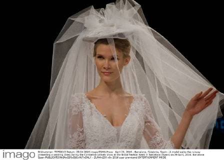 April 29, 2016 - Barcelona, Catalonia, Spain - A model walks the runway presenting a wedding dress during the Cymbeline catwalk show at the Bridal Fashion Week in Barcelona (Spain) on 29 April, 2016. Barcelona Spain  - ZUMAn230