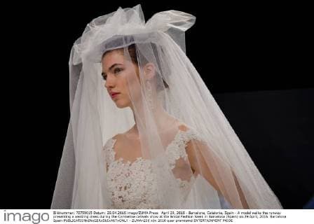 April 29, 2016 - Barcelona, Catalonia, Spain - A model walks the runway presenting a wedding dress during the Cymbeline catwalk show at the Bridal Fashion Week in Barcelona (Spain) on 29 April, 2016. Barcelona Spain  - ZUMAn230