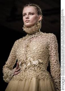 April 29, 2016 - Barcelona, Catalonia, Spain - A model walks the runway presenting a wedding dress of the Spring Summer 2017 collection during the Carla Ruiz catwalk show at the Barcelona Bridal Fashion Week 2016 Barcelona Spain - ZUMAo105