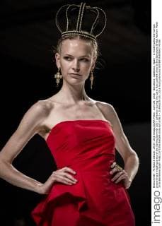 April 29, 2016 - Barcelona, Catalonia, Spain - A model walks the runway presenting a wedding dress of the Spring Summer 2017 collection during the Carla Ruiz catwalk show at the Barcelona Bridal Fashion Week 2016 Barcelona Spain - ZUMAo105